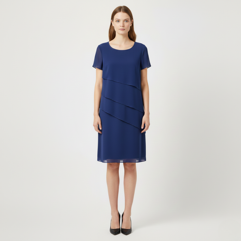 Woman wearing a blue dress on a white background