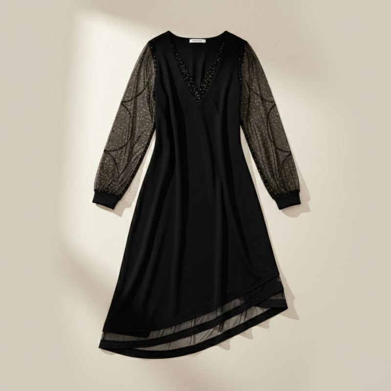 view of black chiffon dress with sheer long sleeves and lightweight flowing design