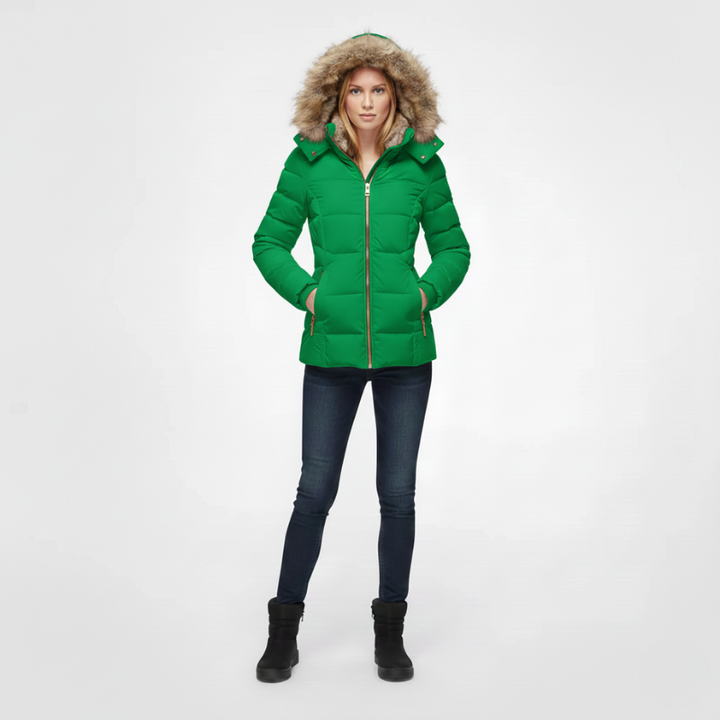 Person wearing a green puffer jacket with fur-lined hood on a white background