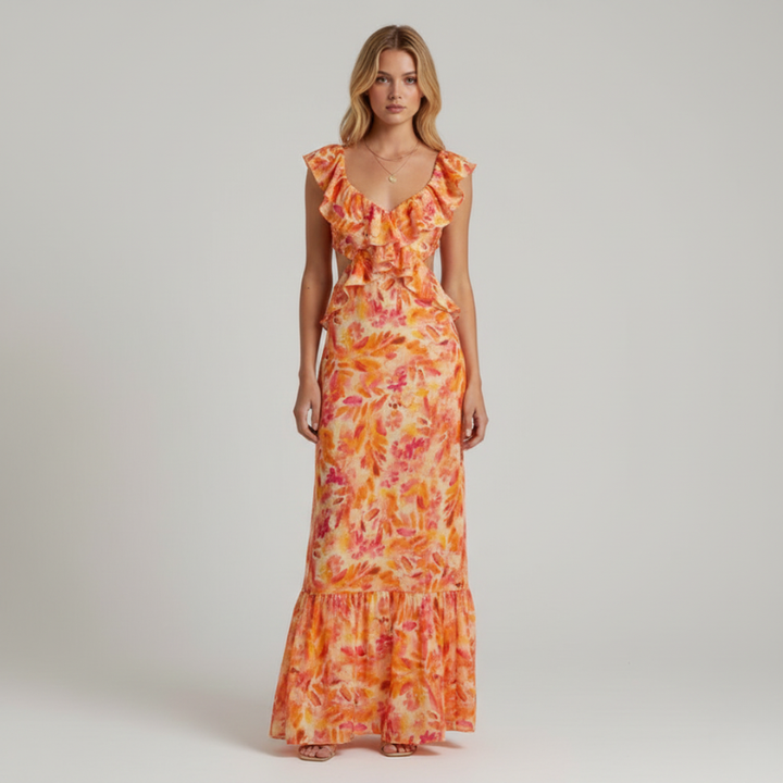 Full-length front view of an orange floral ruffle maxi dress for women photographed in a clean studio setting.