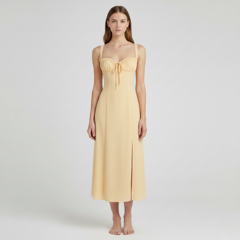 Woman wearing a yellow dress on a white background