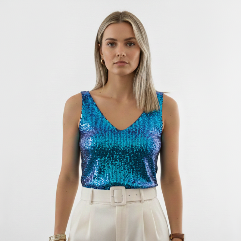 Woman wearing a vibrant blue sequin sleeveless top designed for party and evening looks.